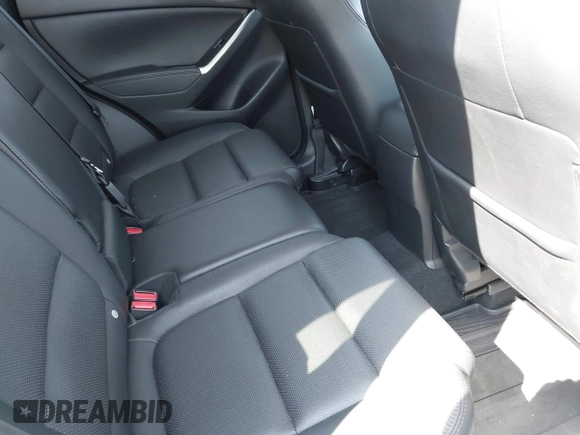 2016 Mazda CX-5 Grand Touring with VIN JM3KE4DY8G0639570, listed as a IAAI auction lot 42098512 with 126,541 mi miles and . Bid and sale history available at carsss.com. Image 8.