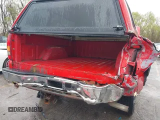 1999 Chevrolet Silverado 1500 LS with VIN 1GCEK14T6XZ153966, listed as a IAAI auction lot 41898476 with 246,792 mi miles. Bid and sale history available at carsss.com. Image 6.