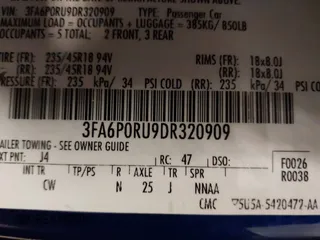 2013 Ford Fusion Titanium Hybrid with VIN 3FA6P0RU9DR320909, listed as a IAAI auction lot 41477530 with 108,153 mi miles. Bid and sale history available at carsss.com. Image 9.