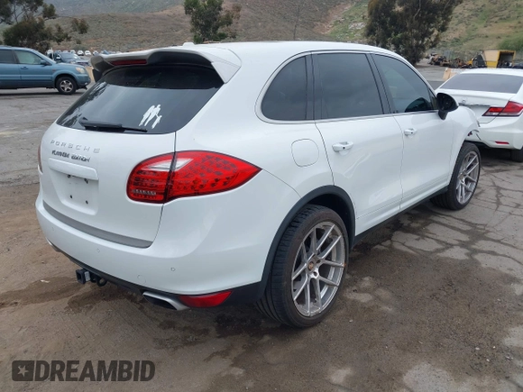 2014 Porsche Cayenne with VIN WP1AA2A27ELA09019, listed as a IAAI auction lot 42068012 with 77,997 mi miles and . Bid and sale history available at DreamBid. Image 4.