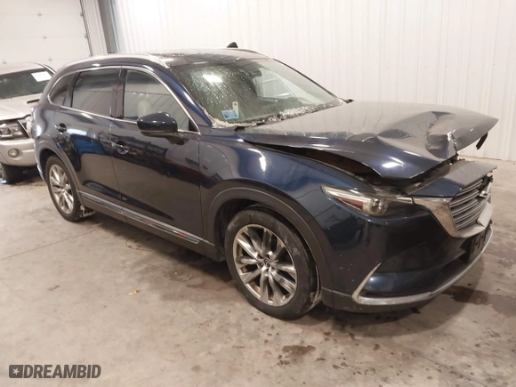 2016 Mazda CX-9 Grand Touring with VIN JM3TCBDY9G0109770, listed as a IAAI auction lot 41551085 with 131,812 mi miles. Bid and sale history available at carsss.com. Image 1.