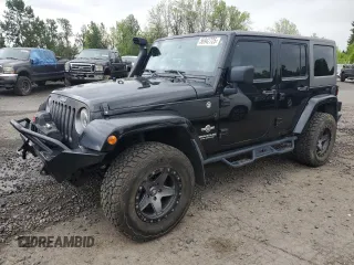 2014 Jeep Wrangler Unlimited Sport with VIN 1C4BJWDG6EL236822, listed as a Copart auction lot 56942725 with 139,703 mi miles and Clean title. Bid and sale history available at DreamBid. Image 1.