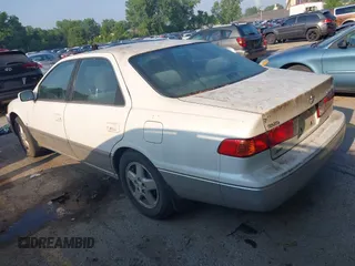 2001 Toyota Camry CE with VIN JT2BG22K010570556, listed as a IAAI auction lot 42458031 with 357,046 mi miles and . Bid and sale history available at DreamBid. Image 3.