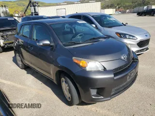 2014 Scion xD with VIN JTKKUPB41E1046114, listed as a Copart auction lot 54599235 with 125,979 mi miles and Salvage title. Bid and sale history available at DreamBid. Image 4.