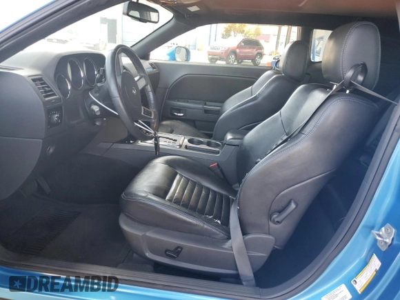 2009 Dodge Challenger R/T z VIN 2B3LJ54T29H635811, wystawiony jako Copart lot #57065925 z przebiegiem 207 261 mil mil oraz Czysty tytuł • Clean title. Historia ofert i sprzedaży dostępna na DreamBid. Obrazek 7.