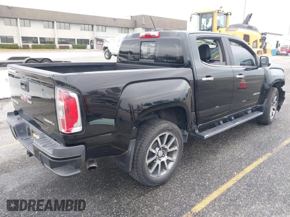 2018 GMC Canyon 4WD Denali with VIN 1GTG6EEN7J1318059, listed as a IAAI auction lot 41772860 with 80,230 mi miles. Bid and sale history available at carsss.com. Image 4.