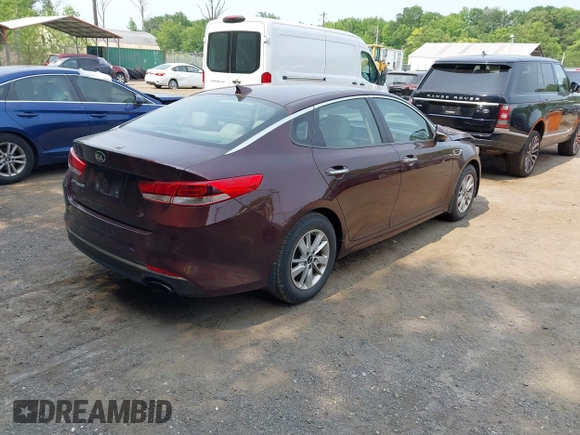 2018 Kia Optima LX with VIN 5XXGT4L36JG185545, listed as a IAAI auction lot 42434301 with 118,303 mi miles and . Bid and sale history available at DreamBid. Image 4.