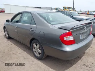 2003 Toyota Camry LE with VIN JTDBE32K530236769, listed as a IAAI auction lot 42250783 with 194,445 mi miles and . Bid and sale history available at DreamBid. Image 3.