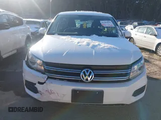 2013 Volkswagen Tiguan SE z VIN WVGBV3AX3DW608410, wystawiony jako IAAI lot #41397876 z przebiegiem 119 867 mil mil oraz . Historia ofert i sprzedaży dostępna na DreamBid. Obrazek 12.