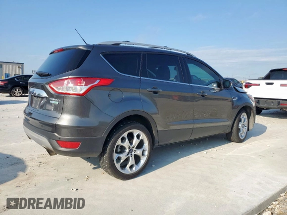 2015 Ford Escape Titanium with VIN 1FMCU0J97FUC88093, listed as a Copart auction lot 60854085 with 64,029 mi miles and Salvage title. Bid and sale history available at DreamBid. Image 3.