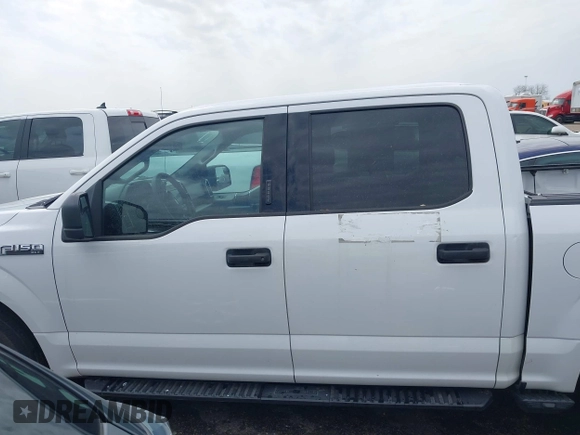 2019 Ford F-150 XL with VIN 1FTEW1C45KKC88050, listed as a IAAI auction lot 41676789 with 99,665 mi miles and . Bid and sale history available at DreamBid. Image 14.