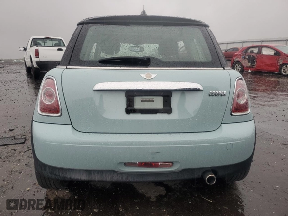 2011 MINI Hardtop with VIN WMWSU3C57BT096973, listed as a Copart auction lot 52726185 with 90,545 mi miles and Salvage title. Bid and sale history available at DreamBid. Image 6.