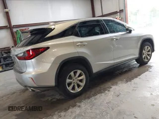 2017 Lexus RX 350 with VIN 2T2ZZMCA7HC052926, listed as a IAAI auction lot 41929054 with 97,886 mi miles and . Bid and sale history available at DreamBid. Image 4.