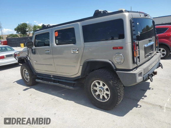2003 Hummer H2 z VIN 5GRGN23U33H142552, wystawiony jako Copart lot #61152055 z przebiegiem Nie podano mil oraz Czysty tytuł • Clean title. Historia ofert i sprzedaży dostępna na DreamBid. Obrazek 2.