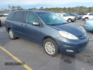 2009 Toyota Sienna XLE with VIN 5TDBK22C79S026370, listed as a IAAI auction lot 41471005 with 200,720 mi miles. Bid and sale history available at carsss.com. Image 1.
