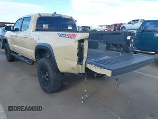 2017 Toyota Tacoma SR5 with VIN 3TMDZ5BN5HM020766, listed as a IAAI auction lot 41778367 with 100,048 mi miles. Bid and sale history available at carsss.com. Image 3.