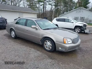 2002 Cadillac DeVille with VIN 1G6KD54Y32U108623, listed as a IAAI auction lot 41957171 with 136,941 mi miles. Bid and sale history available at carsss.com. Image 1.