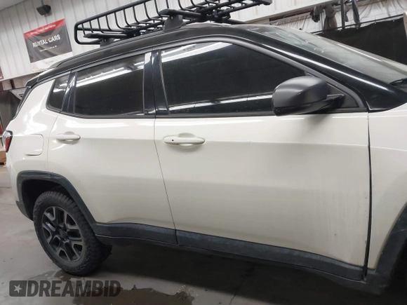 2019 Jeep Compass Trailhawk with VIN 3C4NJDDB8KT668110, listed as a IAAI auction lot 41700848 with 75,855 mi miles and . Bid and sale history available at carsss.com. Image 14.