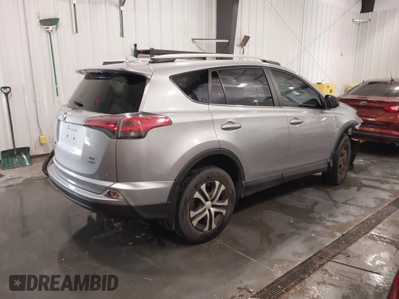 2016 Toyota RAV4 LE with VIN 2T3BFREV7GW450556, listed as a IAAI auction lot 41815720 with 106,734 mi miles. Bid and sale history available at carsss.com. Image 4.