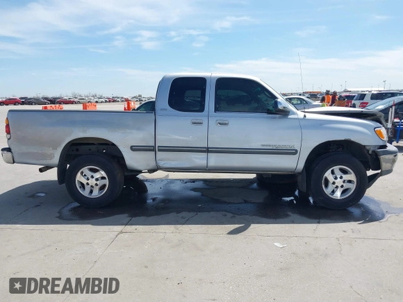 2000 Toyota Tundra SR5 with VIN 5TBRT3411YS070241, listed as a IAAI auction lot 41785990 with 204,276 mi miles and . Bid and sale history available at DreamBid. Image 13.