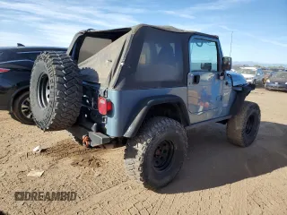 1998 Jeep Wrangler Sport with VIN 1J4FY19S2WP719595, listed as a Copart auction lot 73013584 with 190,056 mi miles and Salvage Title. Bid and sale history available at carsss.com. Image 3.