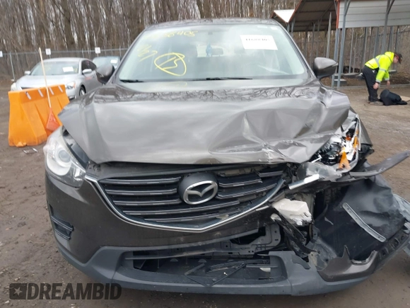 2016 Mazda CX-5 Sport with VIN JM3KE4BY8G0895209, listed as a IAAI auction lot 41688405 with 115,954 mi miles. Bid and sale history available at carsss.com. Image 12.
