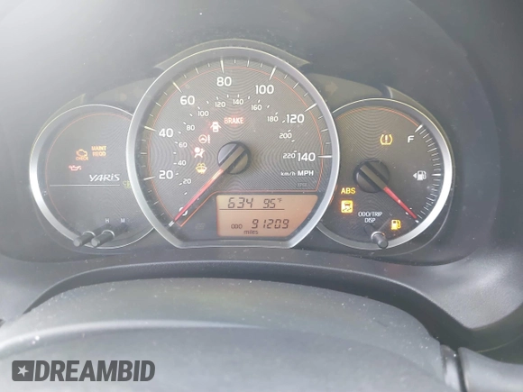 2014 Toyota Yaris L with VIN JTDJTUD33ED592307, listed as a IAAI auction lot 41418409 with 91,209 mi miles and . Bid and sale history available at DreamBid. Image 7.