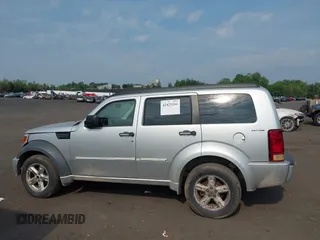 2010 Dodge Nitro SXT z VIN 1D4PU5GK8AW146087, wystawiony jako IAAI lot #42423104 z przebiegiem 220 381 mil mil oraz . Historia ofert i sprzedaży dostępna na DreamBid. Obrazek 14.