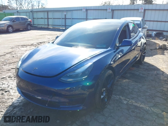 2023 Tesla Model 3 Long Range with VIN 5YJ3E1EB0PF688172, listed as a IAAI auction lot 41411580 with 21,125 mi miles and . Bid and sale history available at DreamBid. Image 19.