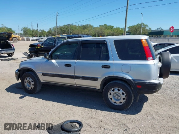 2000 Honda CR-V LX with VIN JHLRD2846YC009880, listed as a IAAI auction lot 41830061 with 263,177 mi miles. Bid and sale history available at carsss.com. Image 13.