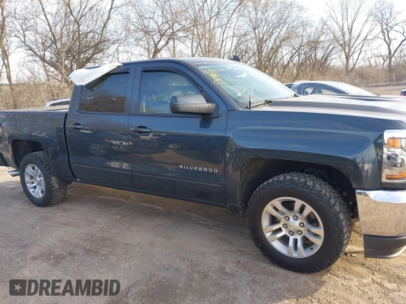 2017 Chevrolet Silverado 1500 LT with VIN 3GCUKREC5HG348435, listed as a IAAI auction lot 41821369 with 140,000 mi miles and . Bid and sale history available at DreamBid. Image 14.