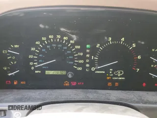 2001 Lexus LX 470 z VIN JTJHT00W213507042, wystawiony jako Copart lot #52634195 z przebiegiem 179 707 mil mil oraz Tytuł czysty. Historia ofert i sprzedaży dostępna na DreamBid. Obrazek 9.