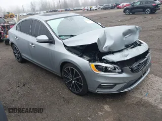 2018 Volvo S60 Dynamic with VIN YV140MTL8J2465284, listed as a IAAI auction lot 41301104 with 107,227 mi miles. Bid and sale history available at carsss.com. Image 1.