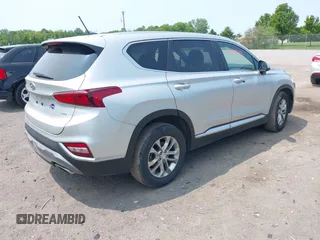 2019 Hyundai Santa Fe SE z VIN 5NMS2CAD2KH058961, wystawiony jako IAAI lot #42395683 z przebiegiem 81 228 mil mil oraz . Historia ofert i sprzedaży dostępna na DreamBid. Obrazek 4.