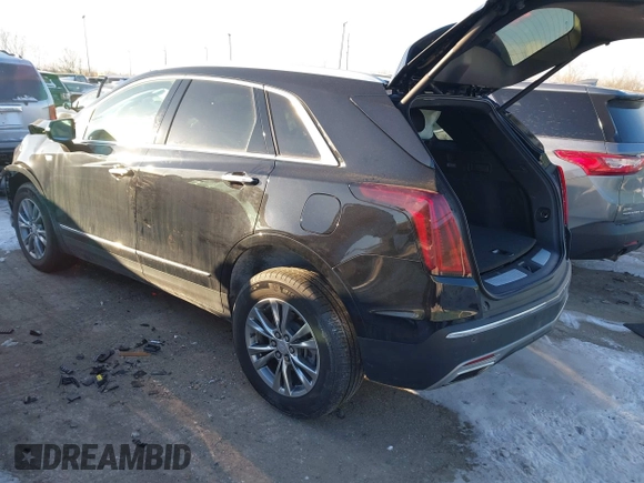 2021 Cadillac XT5 AWD Premium Luxury with VIN 1GYKNDRS2MZ152878, listed as a IAAI auction lot 41347259 with 21,891 mi miles. Bid and sale history available at carsss.com. Image 3.