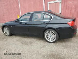 2012 BMW 3 Series 328i with VIN WBA3A5C57CF345040, listed as a Copart auction lot 63761735 with 106,665 mi miles and Clean title. Bid and sale history available at DreamBid. Image 2.