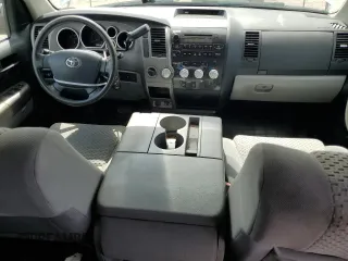 2012 Toyota Tundra 4WD Truck with VIN 5TFCY5F15CX013941, listed as a Copart auction lot 69946754 with 163,228 mi miles and Salvage Title. Bid and sale history available at carsss.com. Image 8.