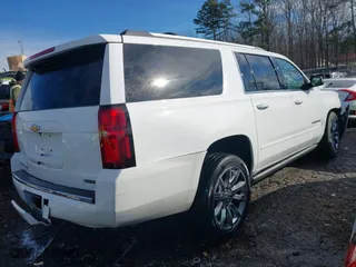 2017 Chevrolet Suburban Premier with VIN 1GNSKJKC9HR117378, listed as a IAAI auction lot 41610682 with 1 mi miles. Bid and sale history available at carsss.com. Image 4.