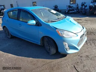 2015 Toyota Prius c One with VIN JTDKDTB37F1104297, listed as a IAAI auction lot 41824438 with 117,562 mi miles. Bid and sale history available at carsss.com. Image 1.