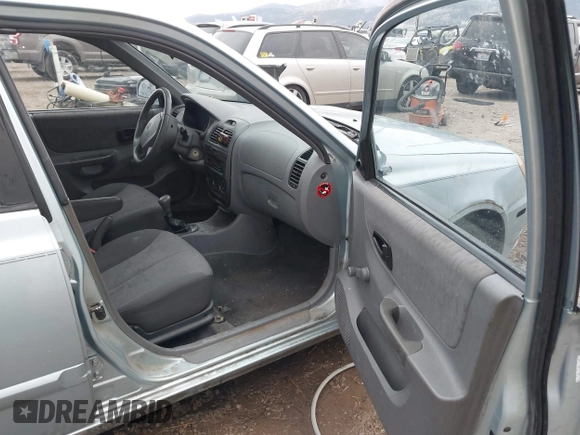 2003 Hyundai Accent GL z VIN KMHCG45C43U465523, wystawiony jako IAAI lot #40883056 z przebiegiem 95 770 mil mil oraz . Historia ofert i sprzedaży dostępna na DreamBid. Obrazek 5.