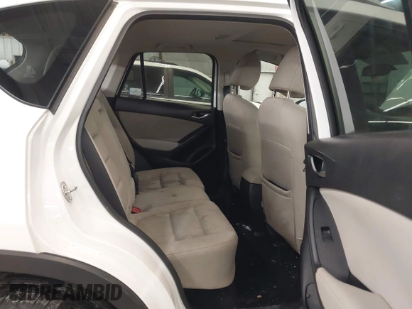 2014 Mazda CX-5 Touring with VIN JM3KE4CY4E0321055, listed as a IAAI auction lot 41613593 with 174,339 mi miles. Bid and sale history available at carsss.com. Image 8.