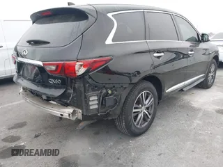 2019 Infiniti QX60 LUXE with VIN 5N1DL0MN7KC500202, listed as a IAAI auction lot 41229623 with 103,626 mi miles. Bid and sale history available at carsss.com. Image 4.