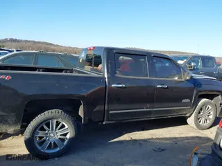2014 Chevrolet Silverado 1500 High Country with VIN 3GCUKTEC1EG437170, listed as a IAAI auction lot 41742882 with 101,779 mi miles. Bid and sale history available at carsss.com. Image 13.
