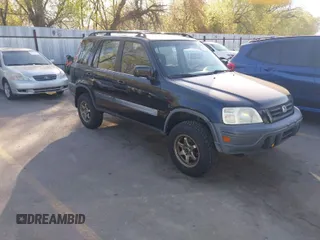 2000 Honda CR-V EX with VIN JHLRD1866YC025833, listed as a IAAI auction lot 42039440 with 238,599 mi miles. Bid and sale history available at carsss.com. Image 1.