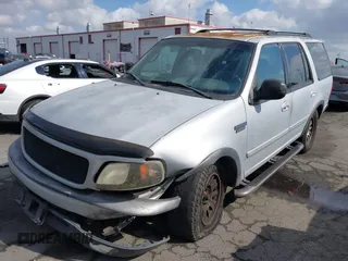 2000 Ford Expedition XLT with VIN 1FMRU1560YLC21781, listed as a IAAI auction lot 41558097 with 218,477 mi miles. Bid and sale history available at carsss.com. Image 17.