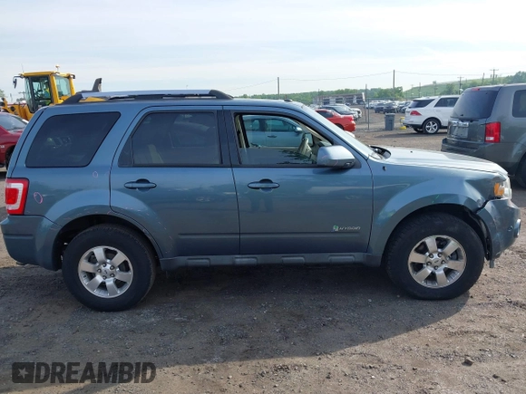2011 Ford Escape Hybrid z VIN 1FMCU4K38BKC60181, wystawiony jako IAAI lot #42330726 z przebiegiem 209 390 mil mil oraz . Historia ofert i sprzedaży dostępna na DreamBid. Obrazek 14.