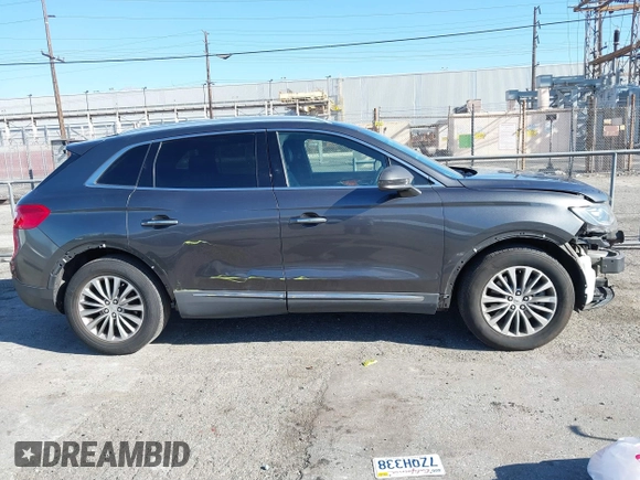 2017 Lincoln MKX Select with VIN 2LMPJ6KR9HBL37562, listed as a IAAI auction lot 41857375 with 103,678 mi miles. Bid and sale history available at carsss.com. Image 14.
