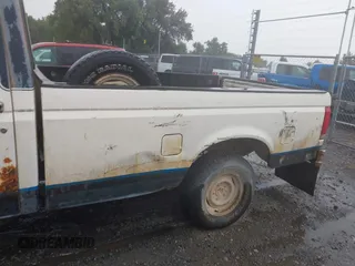 1988 Ford F-150 with VIN 2FTEF14Y6JCA33783, listed as a IAAI auction lot 42519893 with 1,135 mi miles and . Bid and sale history available at DreamBid. Image 6.