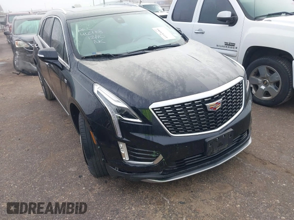 2021 Cadillac XT5 FWD Premium Luxury with VIN 1GYKNCRS2MZ185678, listed as a IAAI auction lot 41143084 with 25,399 mi miles and . Bid and sale history available at carsss.com. Image 1.
