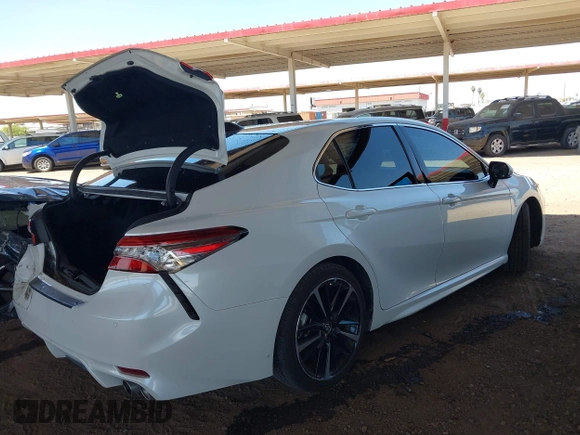 2018 Toyota Camry XSE with VIN 4T1BZ1HK3JU014085, listed as a IAAI auction lot 42235395 with 67,447 mi miles and . Bid and sale history available at DreamBid. Image 4.